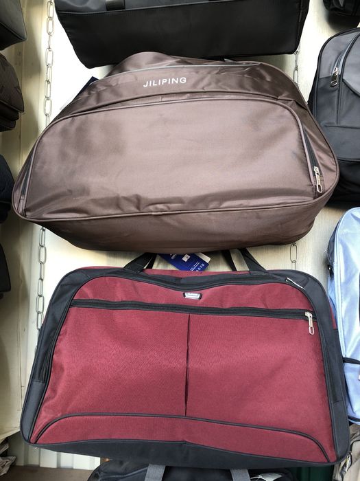 Дорожные сумки с ремешком