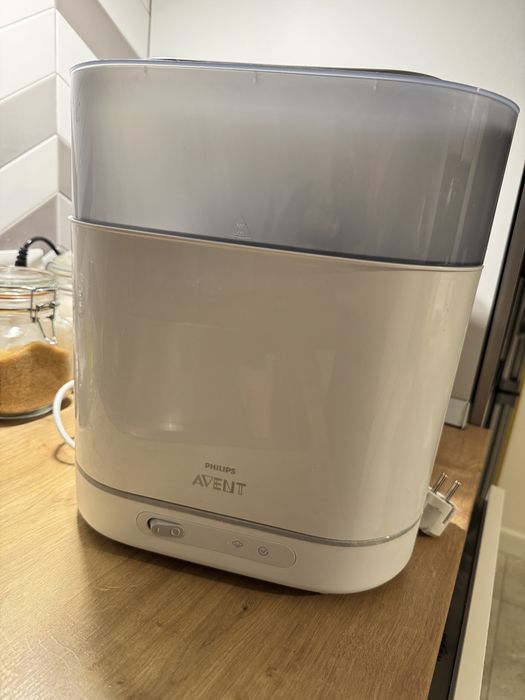 Vand sterilizator Avent 4 in 1 - ca nou , am si cutia