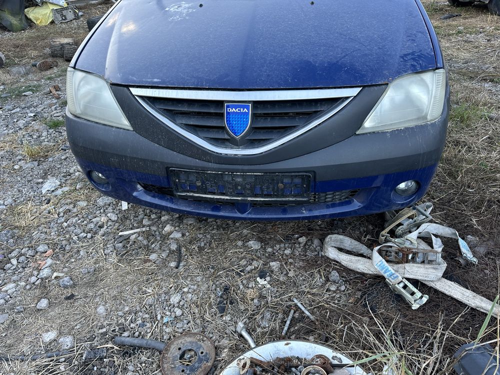 Dezmembrez Dacia Logan 1.5 1.4 bara faruri usi capota motor interior