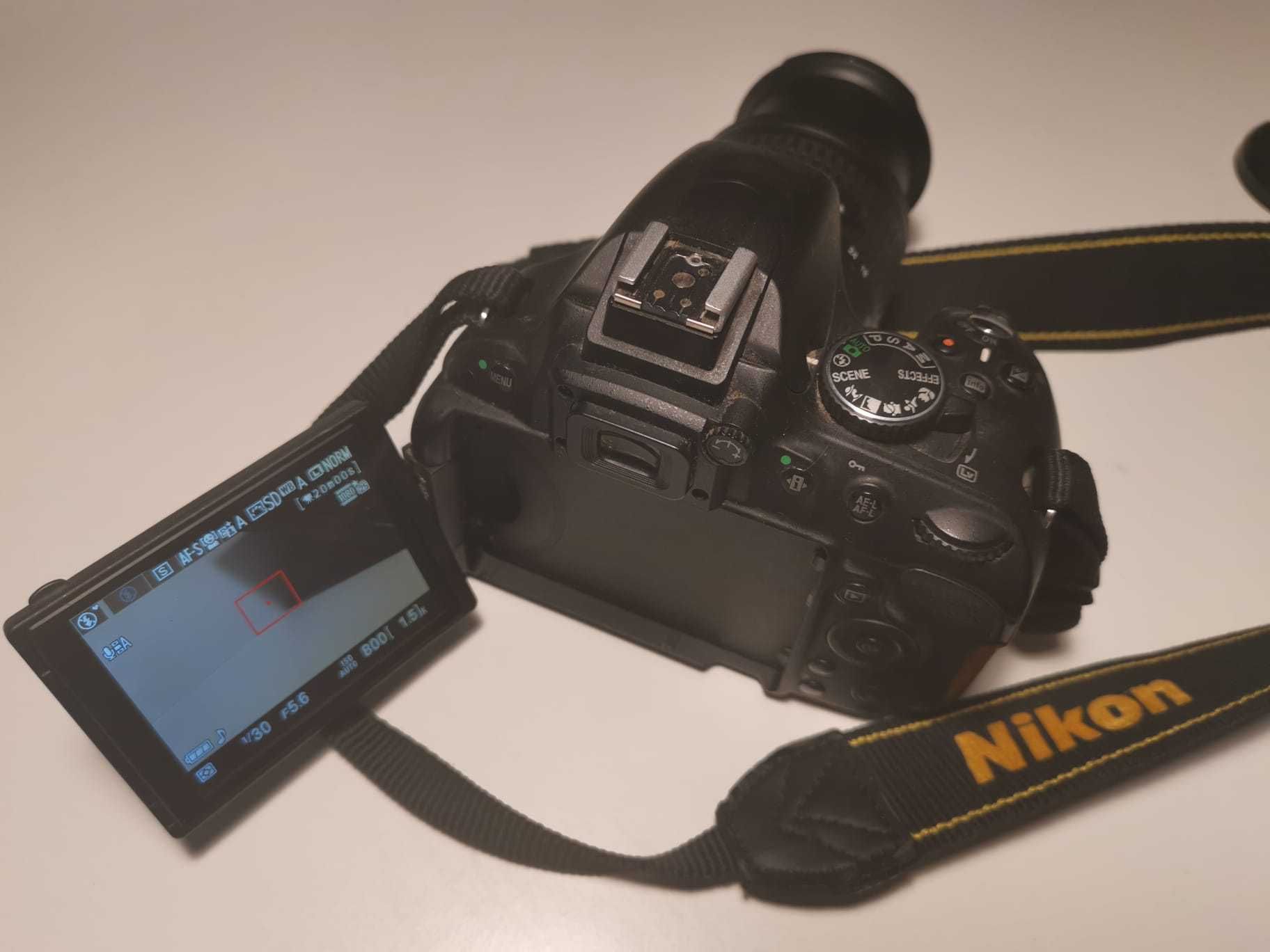 Nikon D5100 + 2 obiective + accesorii – doar 9425 cadre