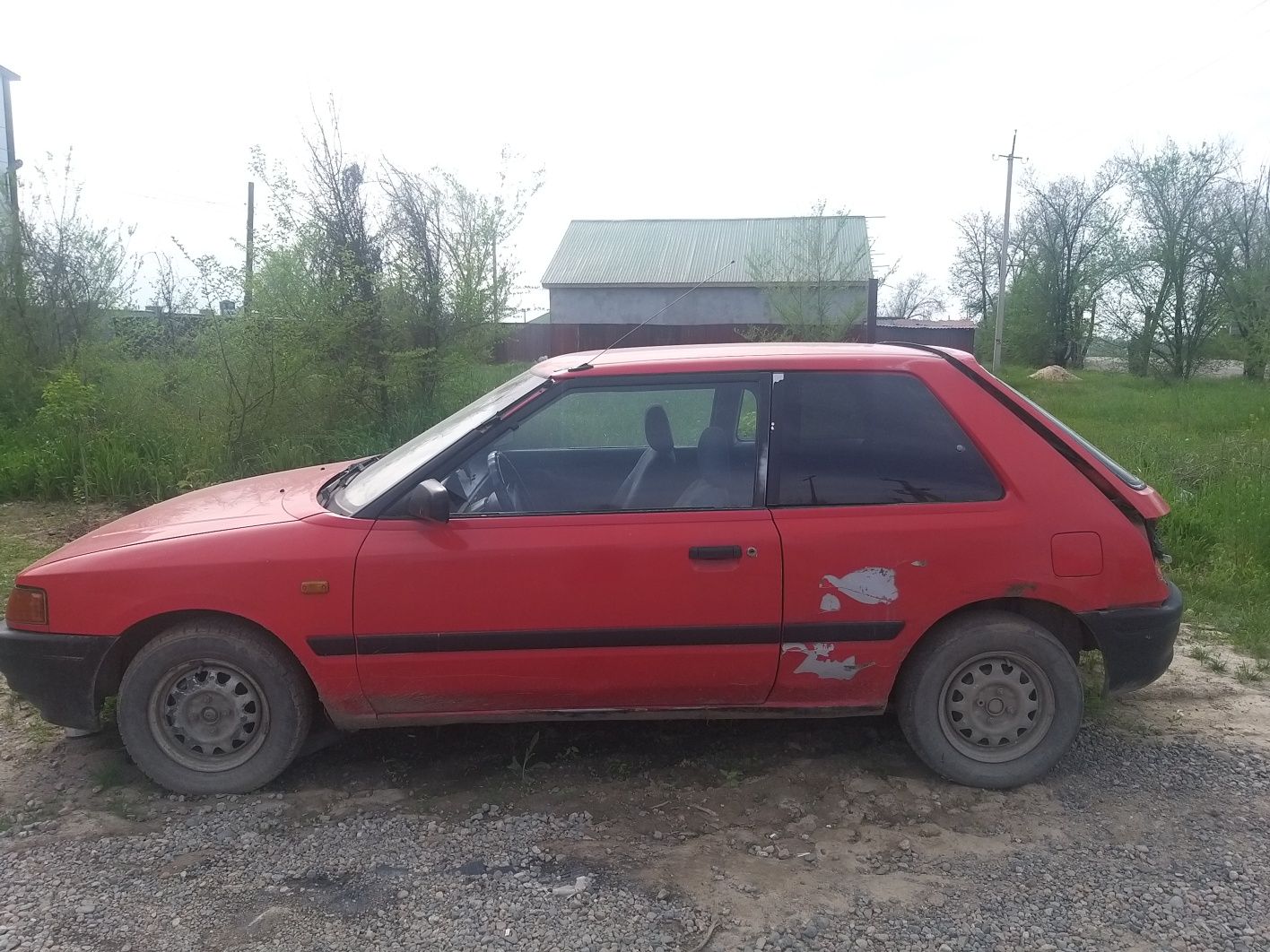 Mazda 323 год:1992