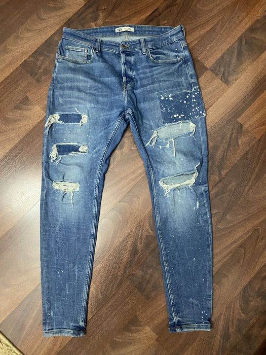 Blugi cu pete si rupturi Zara