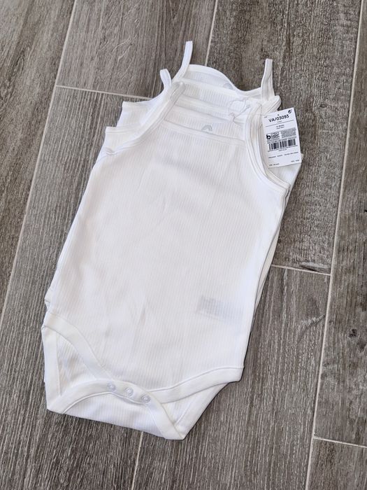 Body unisex next 12-18 luni