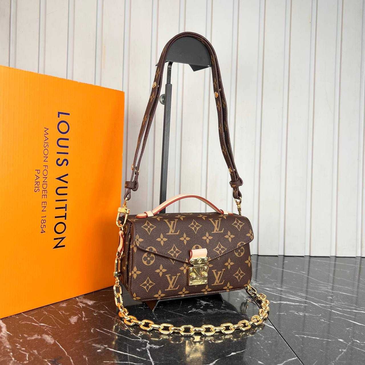 Louis Vuitton genti din piele naturala