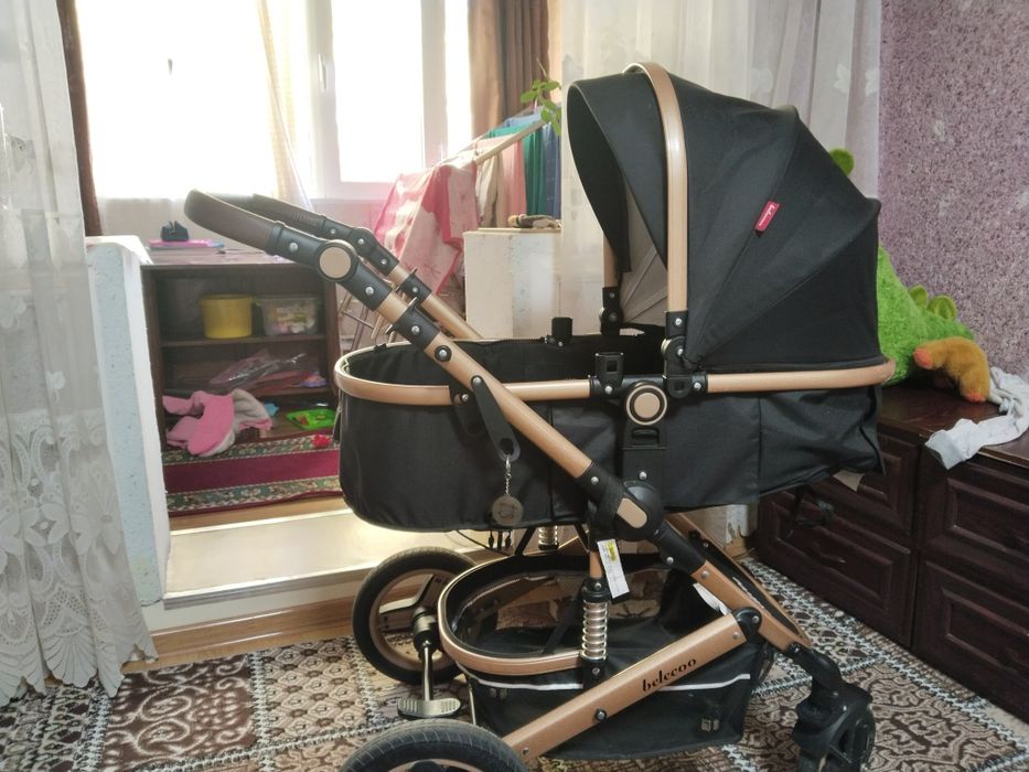 Детская прогулочная коляска