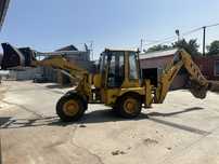 Buldoexcavator Komatsu WB70a