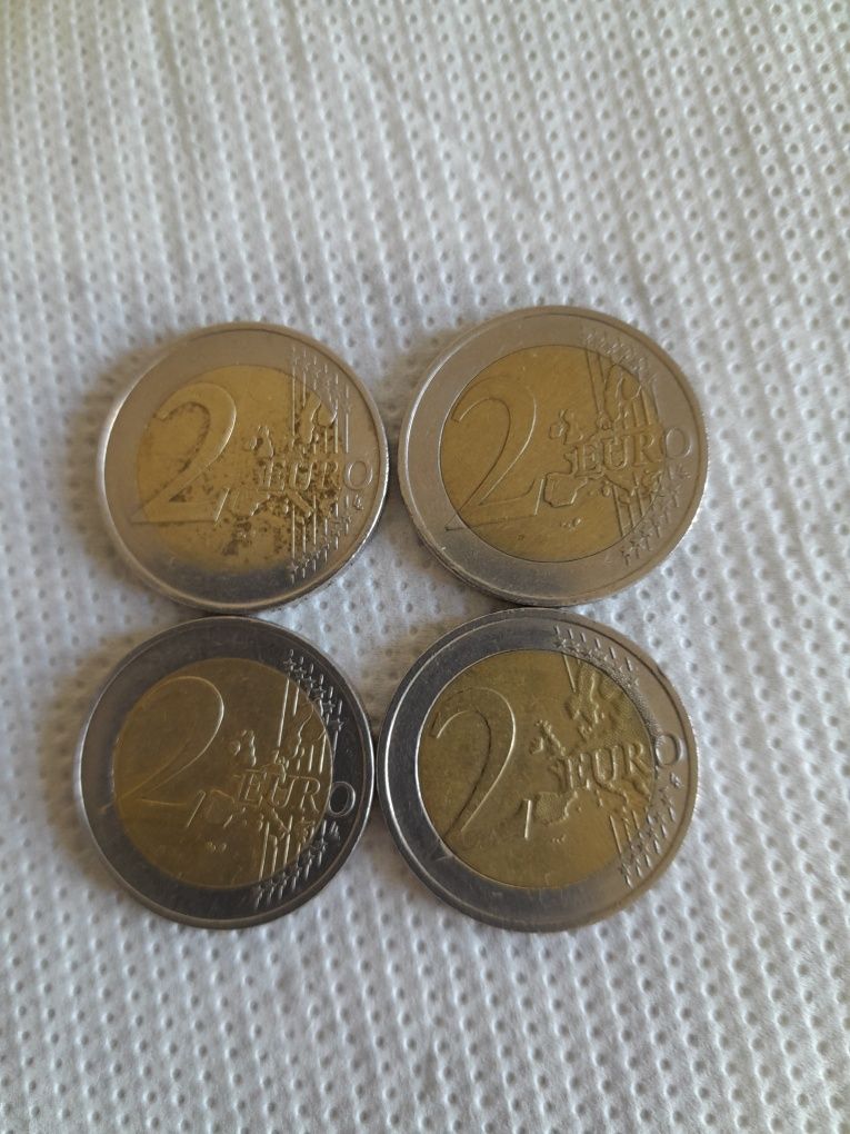 Vind 4 monede de 2 . 2002, 2003, 2004 si2013.