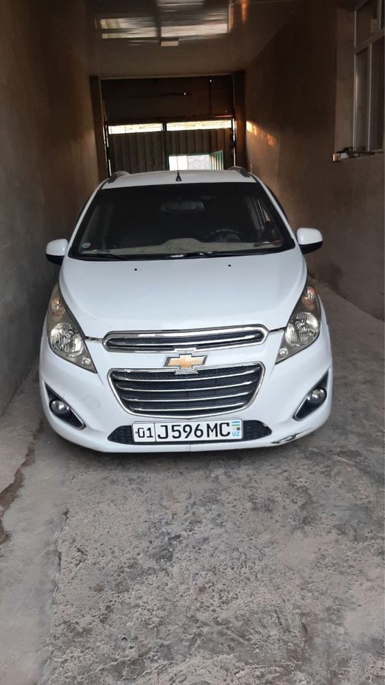 Chevrolet Spark 2011. 3-pozitsiya