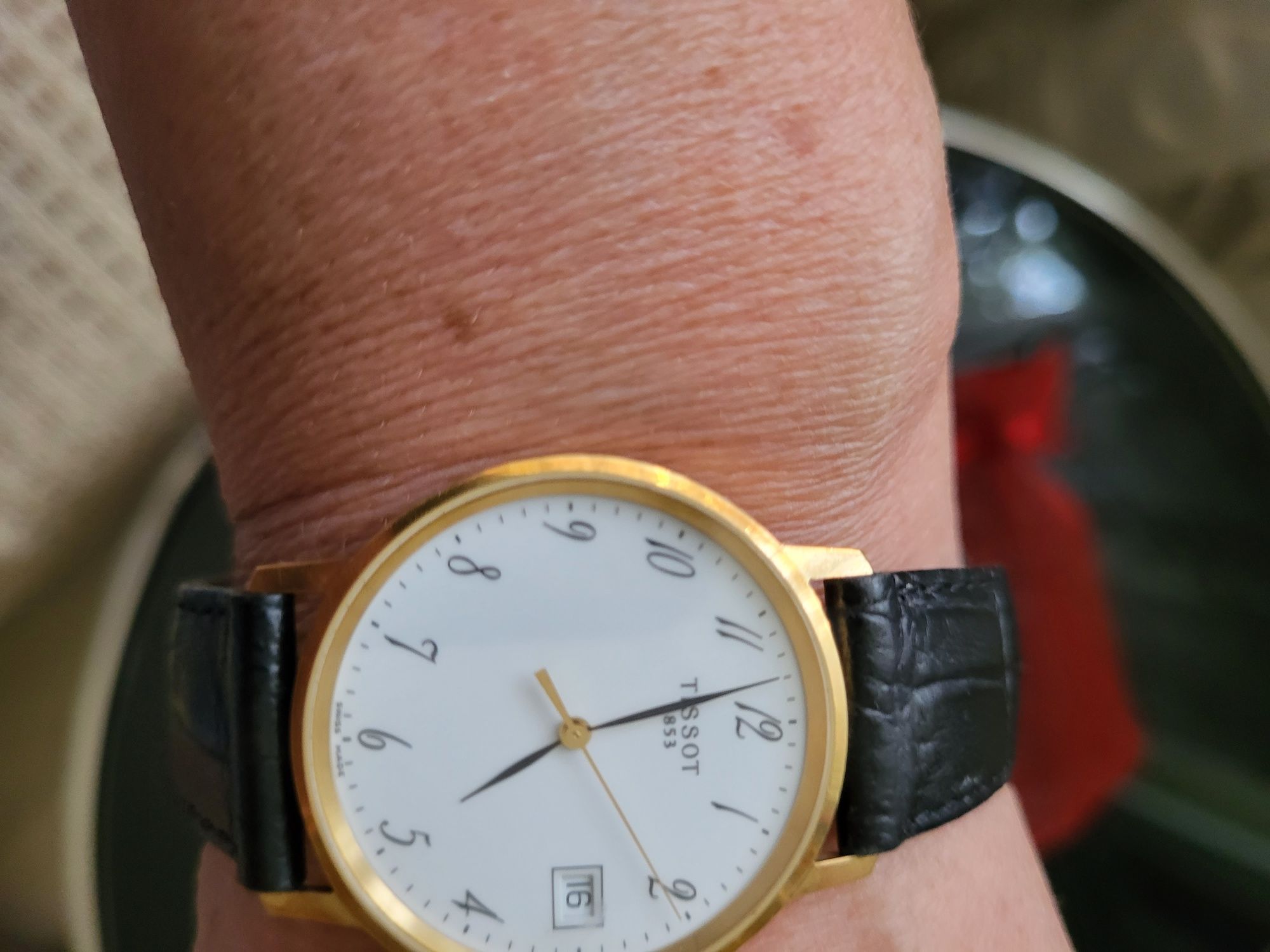 часы золотые Tissot