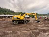 Vand escavator Caterpillar M315C pe roti