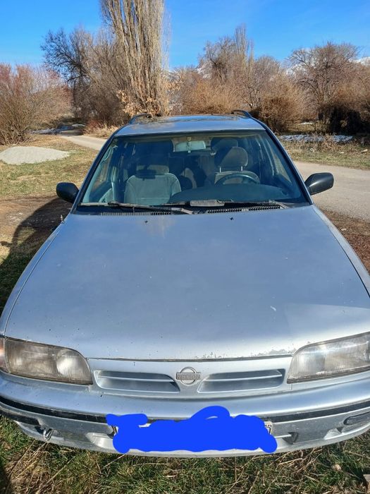 Машина Nissan primera 1991