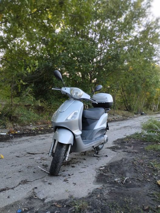 Скутер piaggio fly 125