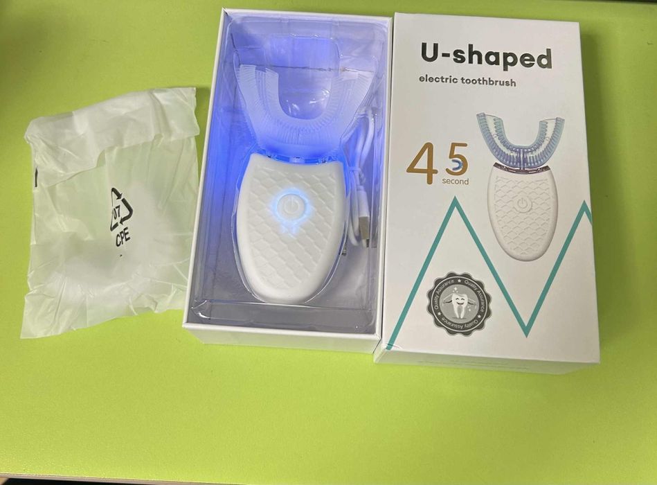 Електрическа у-образна четка за зъби