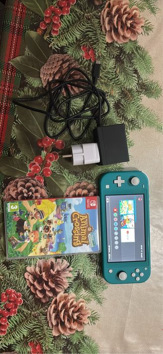 Vand nintendo switch lite stare foarte buna + un joc 600 lei