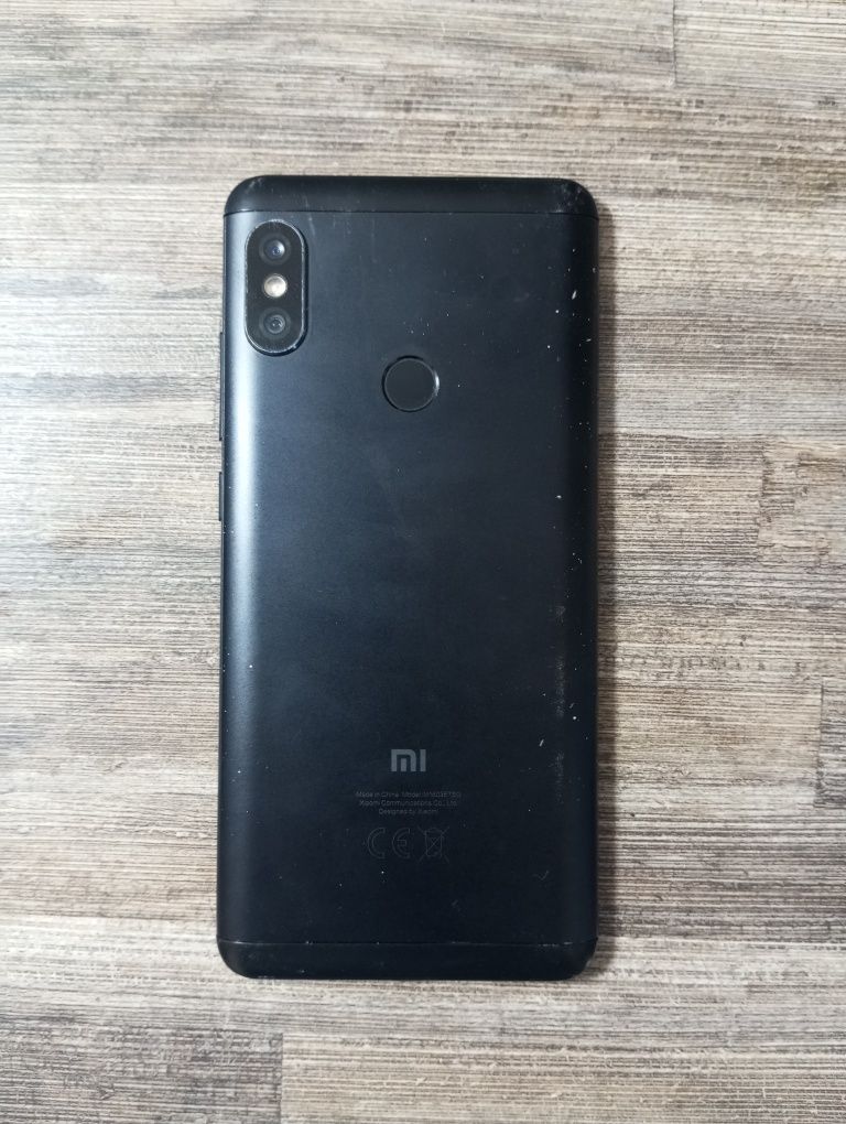 Redmi.  Note. 5.