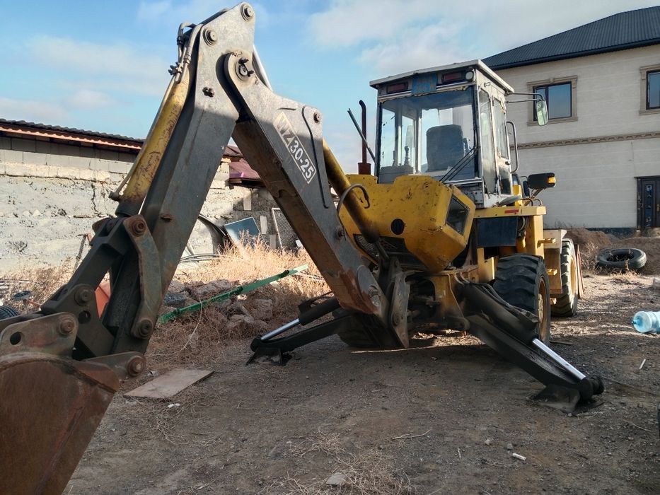 Продам экскаватор погрузчик