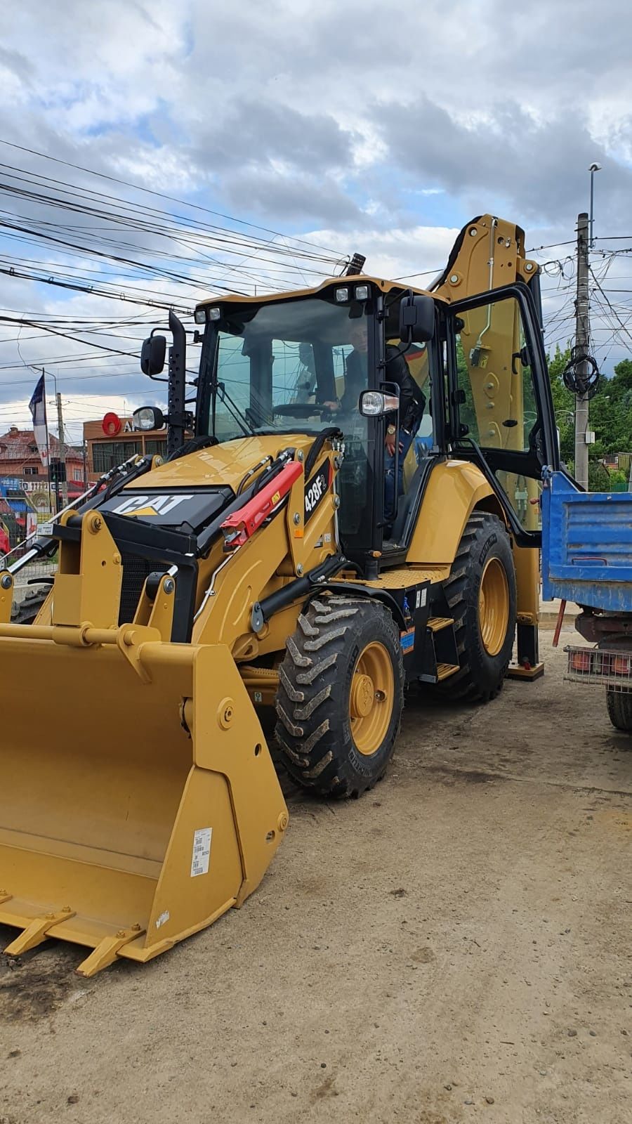 Buldoexcavator de inchiriat **In Iasi si localitatile limitrofe**