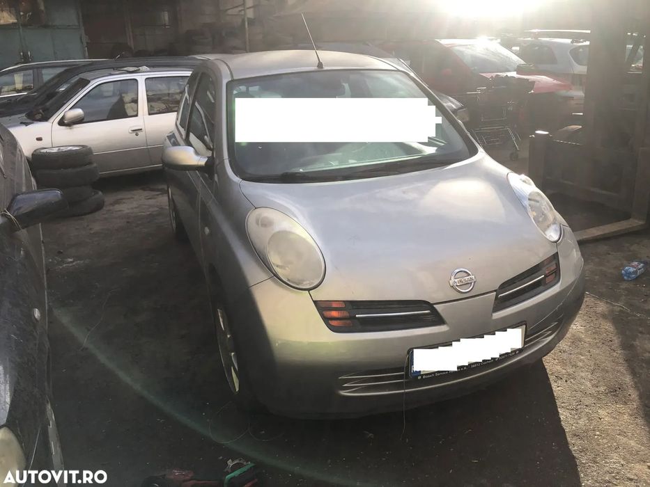 Aripa dreapta fata Nissan Micra 2005 gri argintiu