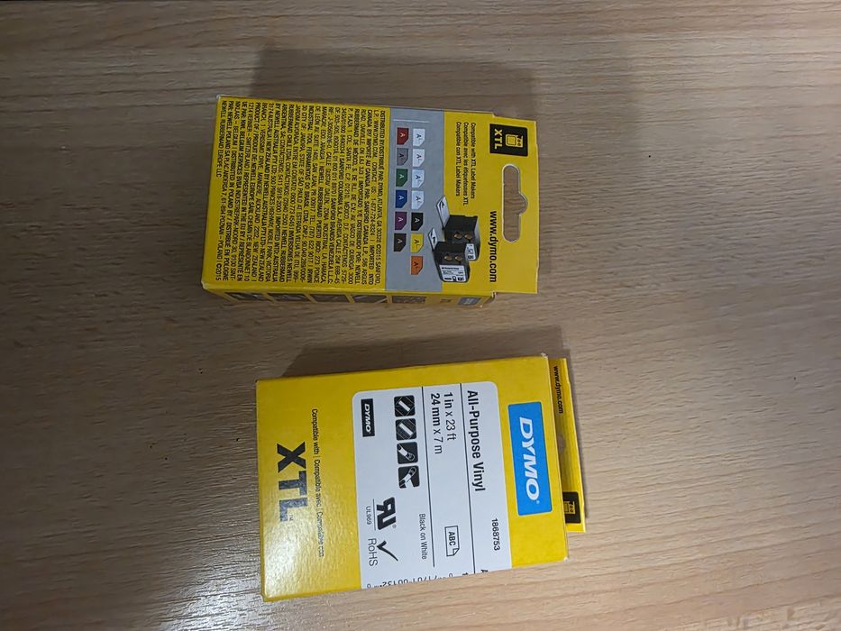 Etichete autoadezive, DYMO 1868753 XTL, vinil, 24mm x 7m, negru/alb