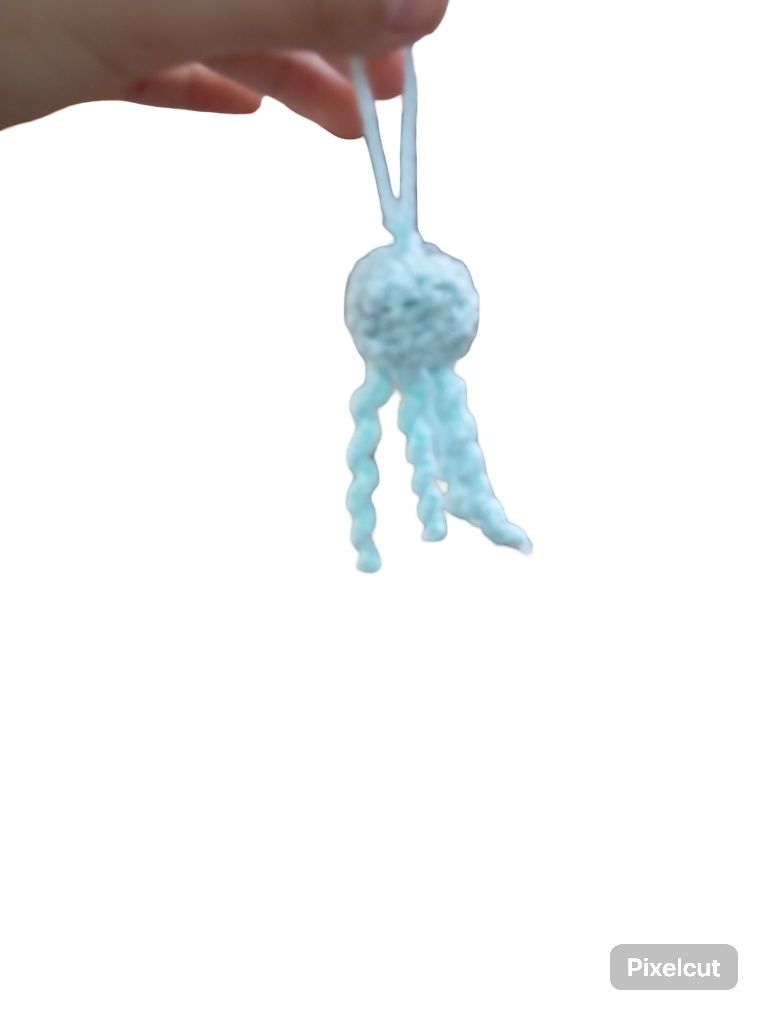 Meduza shaklidagi toʻqima kalitga osgich