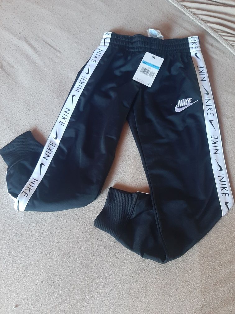 Vand pantaloni trening Nike copii M