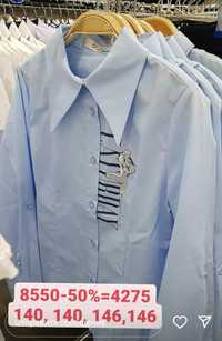 Продам школьную  блузку Делорас