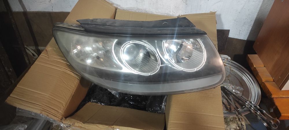 Продам фары с билед линзами на Санта фе 2 см