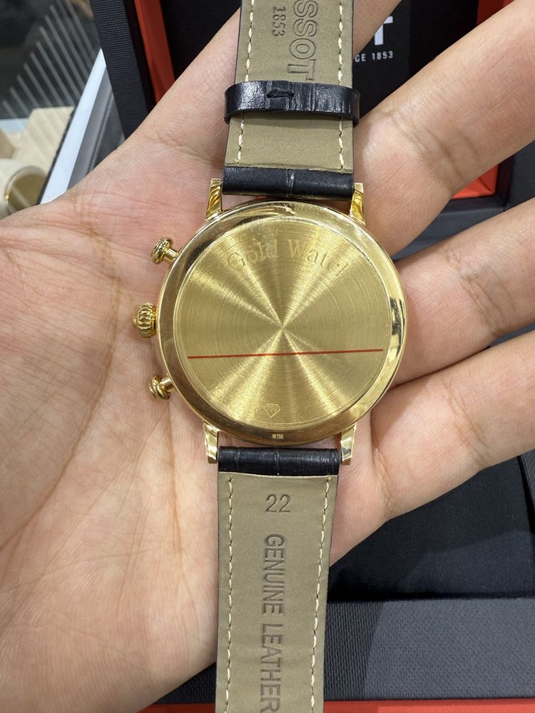 Золотые часы Tissot 750пробы