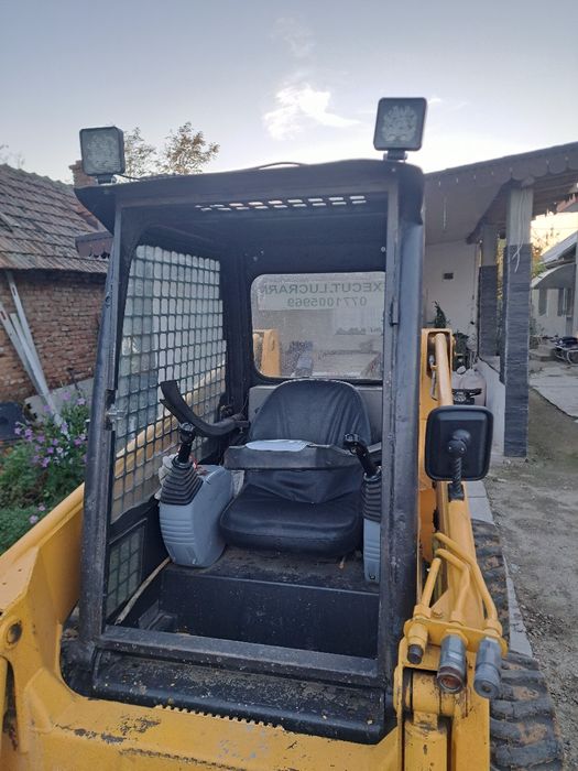 Încărcător frontal ( bobcat ) komatsu sk714