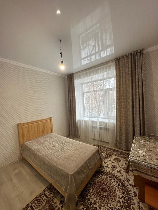 Кровать  и ковёр