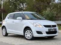 Suzuki Swift 4x4 - 2012 - 1.3 benzina - Alb perlat / Klima / Incalzire