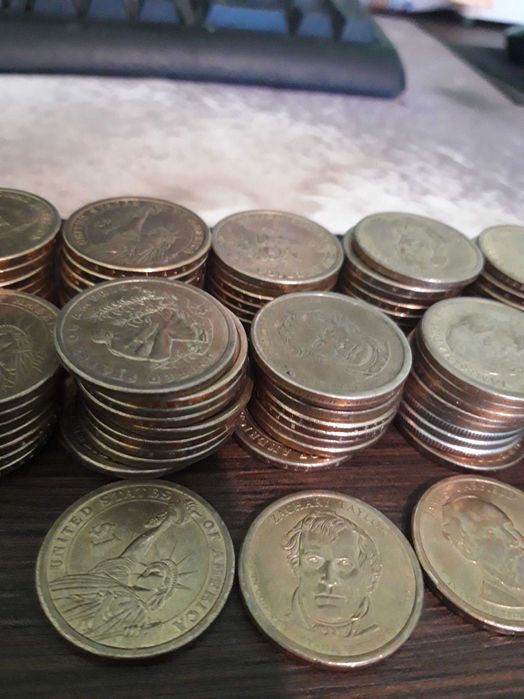монети 1 $ и половин $