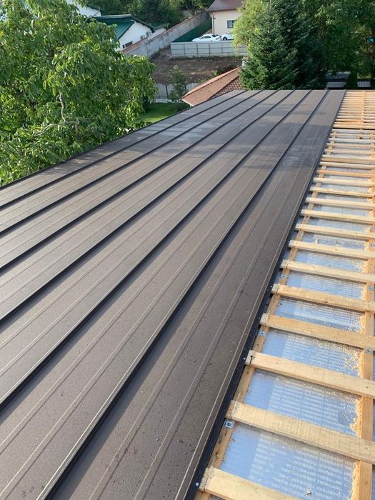 Servicii profesionale acoperişuri jgheaburi burlane reparații urgente