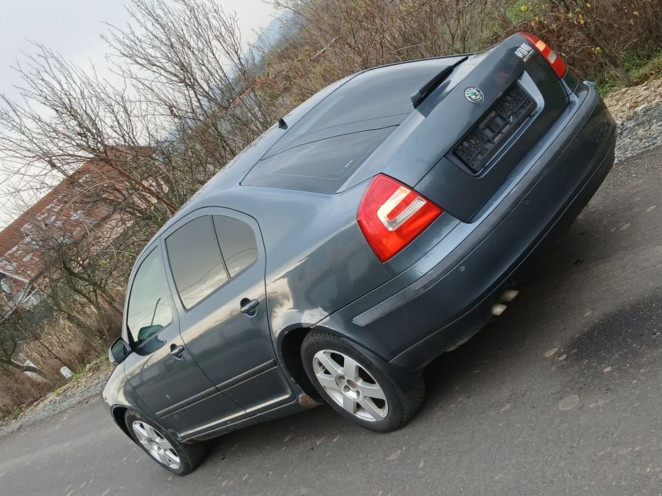 bara aripa use tragar capota grila far stop skoda octavia 2 2007