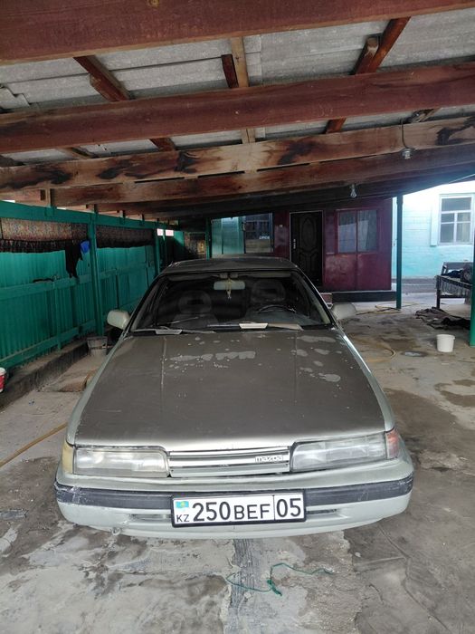 Мазда 626 2,0л .