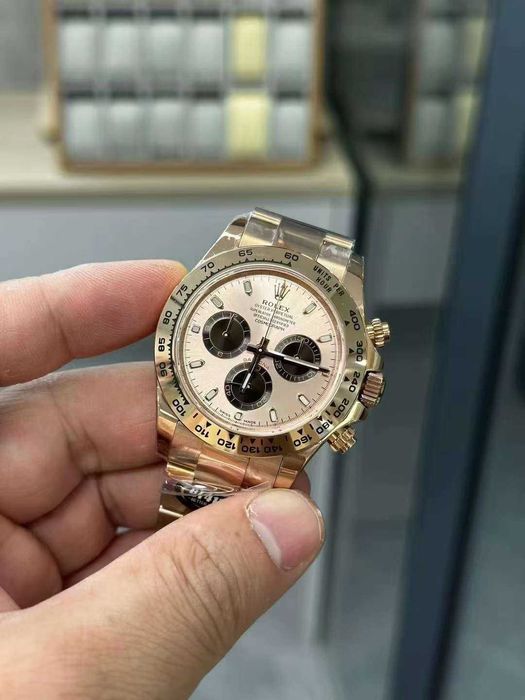 rolex daytona розово злато