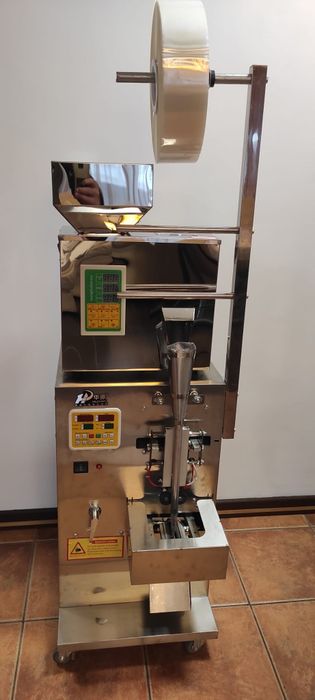 Masina automata de cantarit si impachetat produse granulare