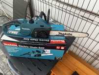 Drujba electrica Makita , folosita o singura data .