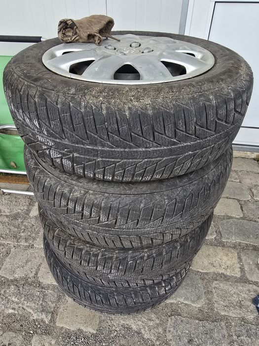 Зимни гуми с джанти и тасове 185/65/R15 за Пежо и Ситроен