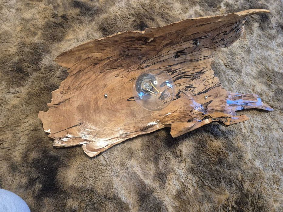 Lustra rustica sculptata manual