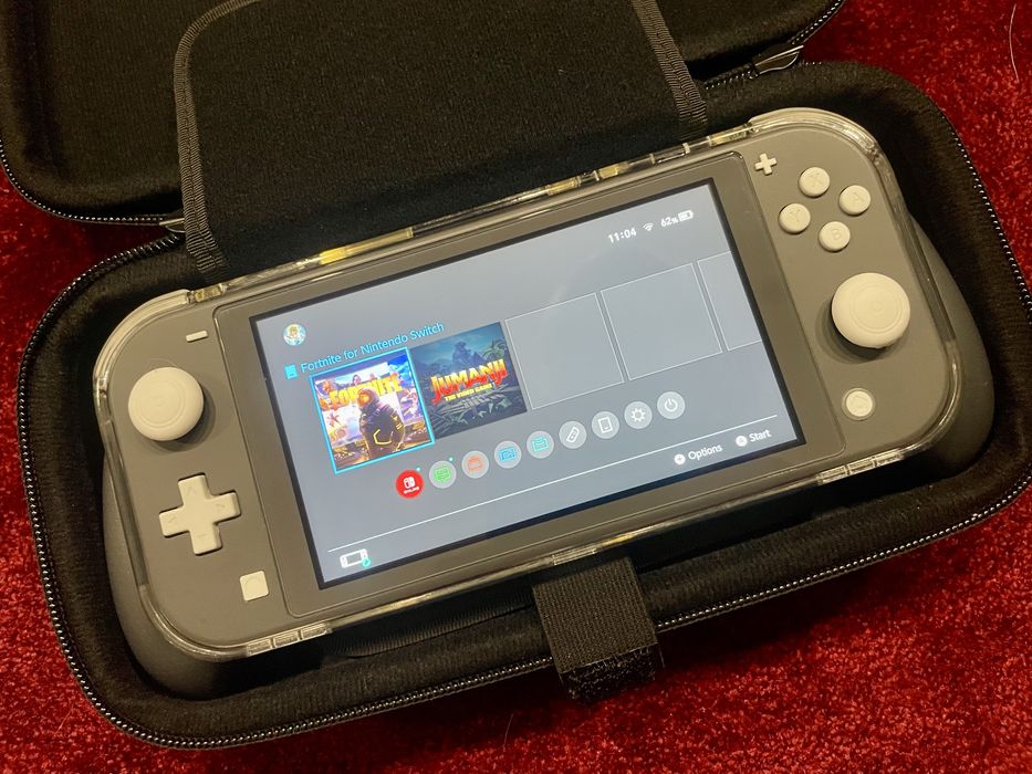 Nintendo Switch lite + accesorii impecabil