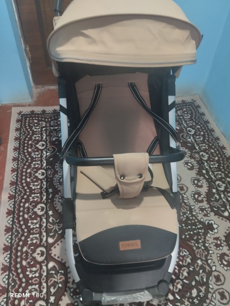 FONDESS kalyaskasi 22kg gacha bolani koʻtaradi