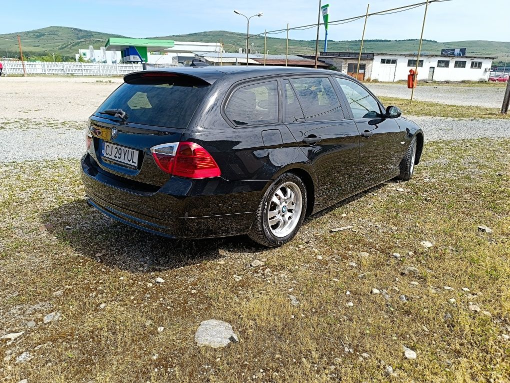 BMW E91 163cp din 2007