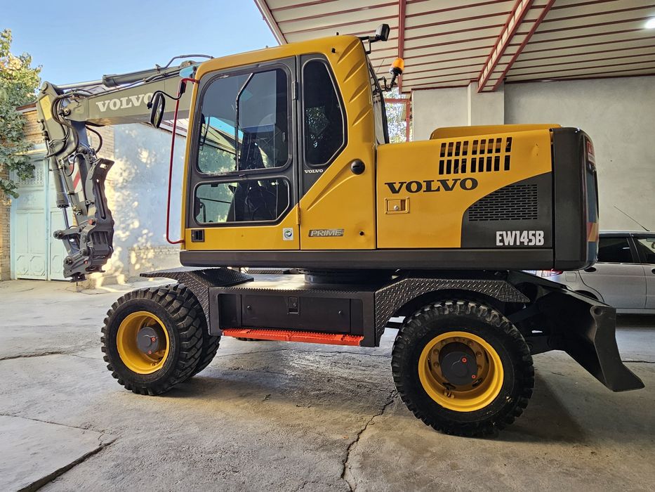 Volvo EW145B экскаватор сотилади