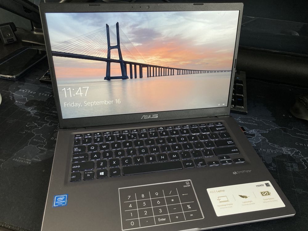 Laptop ASUS , Intel Celeron N4020 pana la 2.8GHz, 14" FullHD 256GB
