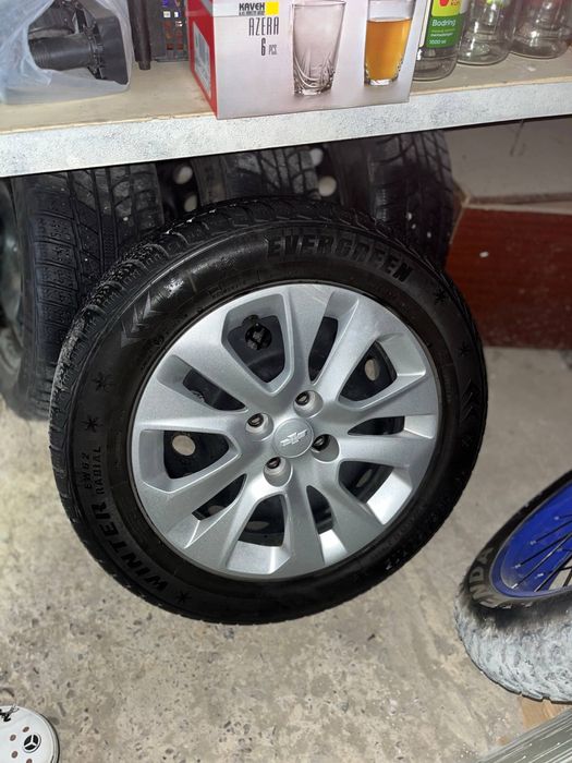 Продам диски с шинами зимние
