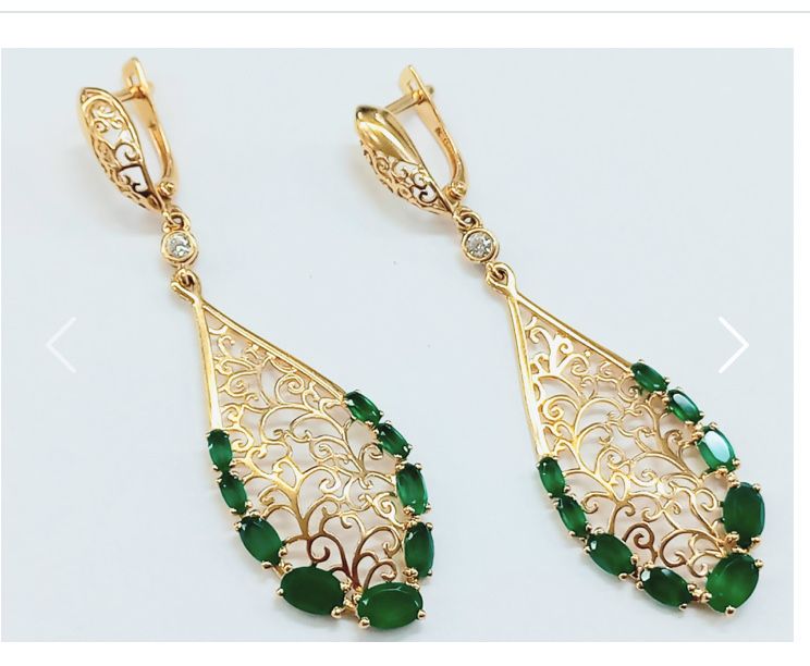 Продам золотые серьги