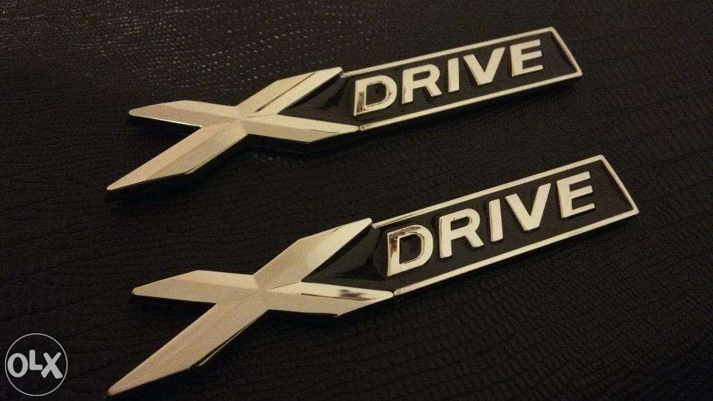 Emblema BMW X-Drive metal negru/crom