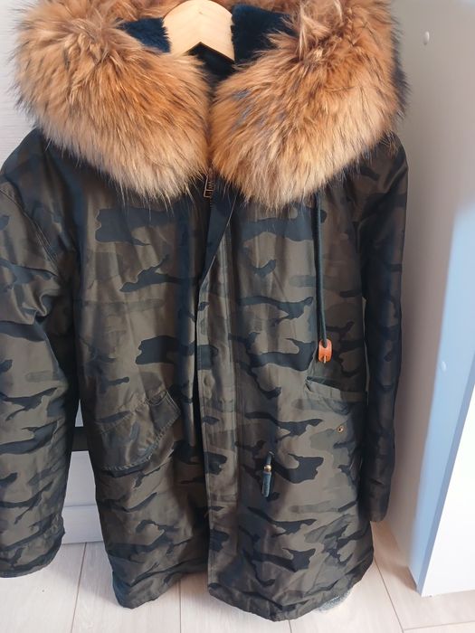Продам зимнюю натуральную куртку 20.000