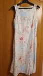 Compleu in, elegant, cu rochie midi, comod.